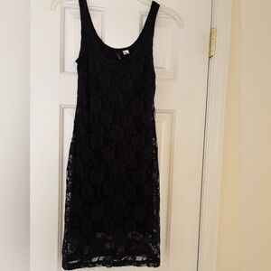 Divided size 6 black lace stretchy dress with under slip.